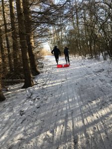 boys running in snow